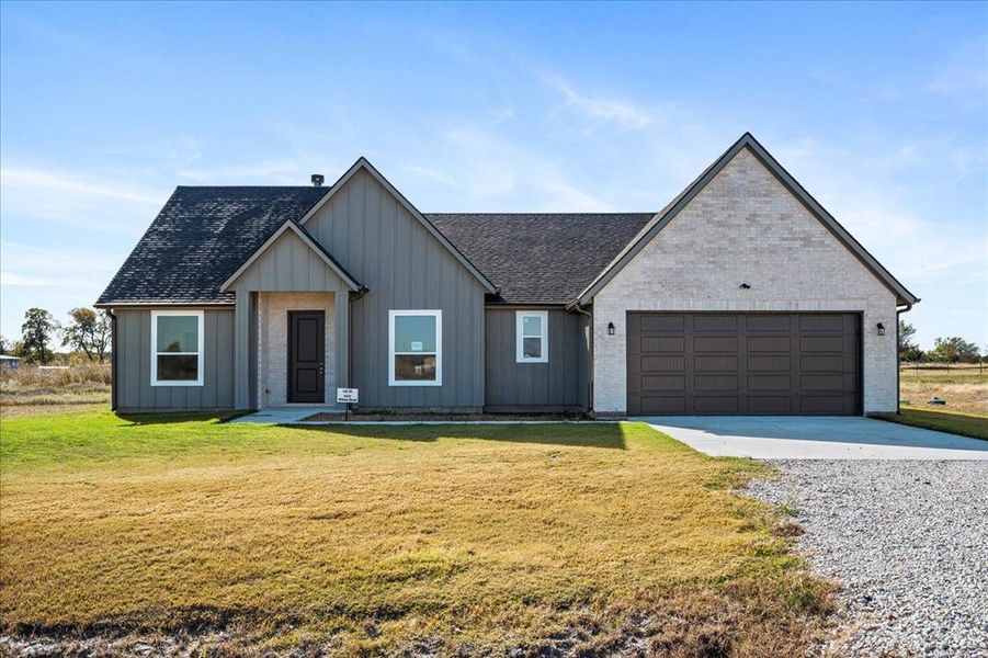 Front exterior of a new home in Briar Branch Estates, Celeste, TX, highlighting curb appeal (Image 1). Front exterior of a new home in Briar Branch Estates, Celeste, TX, highlighting curb appeal (Image 1).