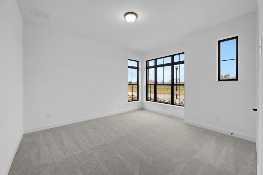 Spacious, unfurnished interior of a new home in Riceland 50’ Alley Load Homesites, Mont Belvieu (Image 20).