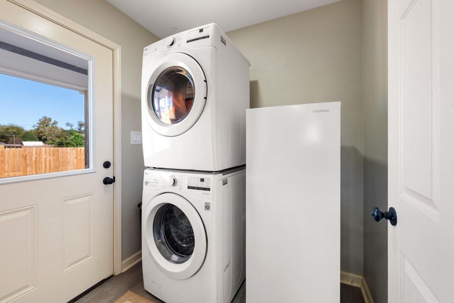 Laundry Room; access to backyard with covered patio