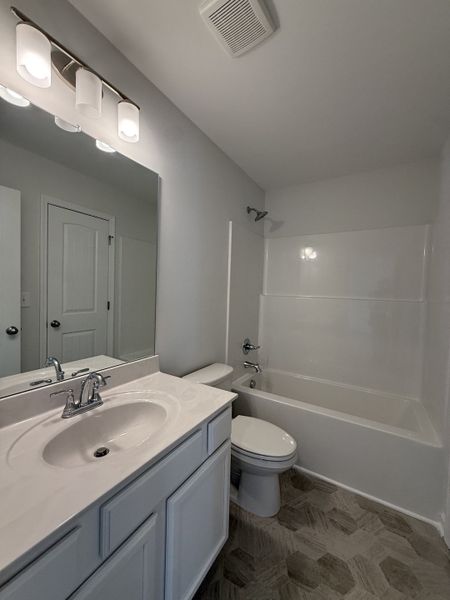 Furnished interior view inside a new home in Legacy Fields, Pleasant View (Image 6).