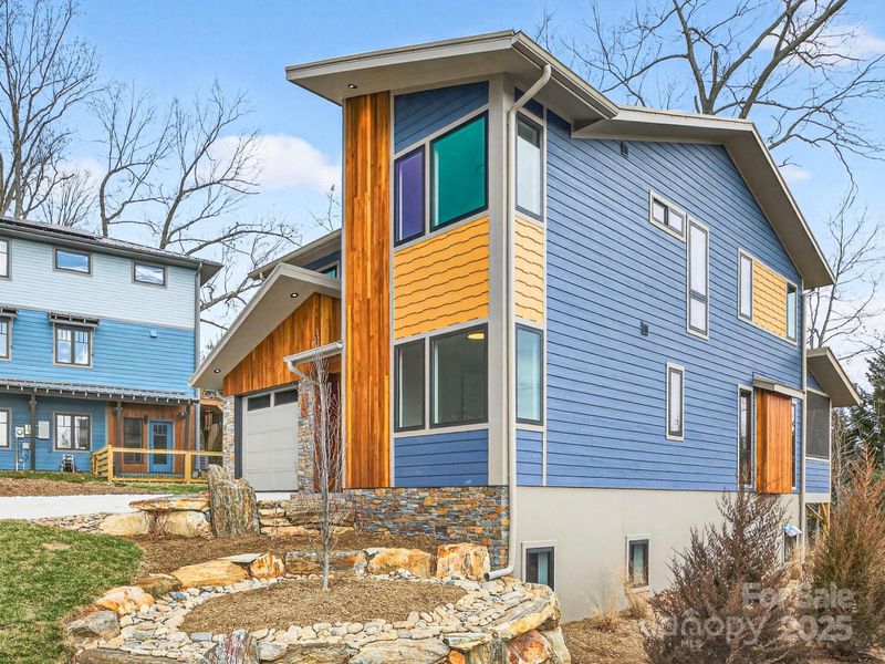 Exterior details and patio area of a home in , Asheville (Image 30).