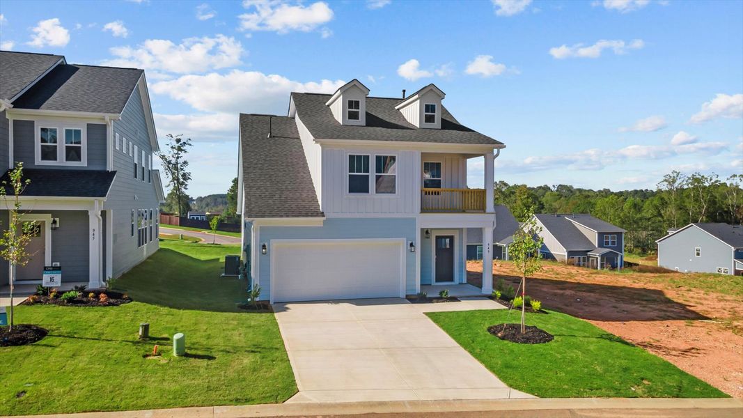 Representative exterior photo of a completed home built from the Freesia by DRB Homes in Spring Branch, Smyrna, TN (Image 23).