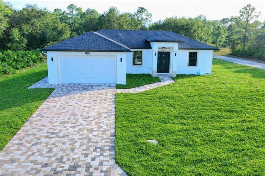 Exterior details and patio area of a home in , Lehigh Acres (Image 3).