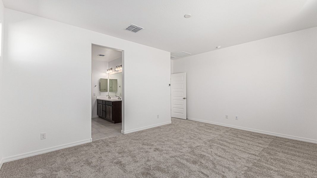 Furnished interior view inside a new home in Apache Farms, Buckeye (Image 22). Furnished interior view inside a new home in Apache Farms, Buckeye (Image 22).