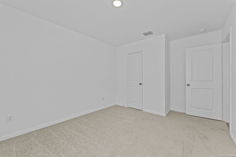 Spacious, unfurnished interior of a new home in Higdon Crossing, San Antonio (Image 14).