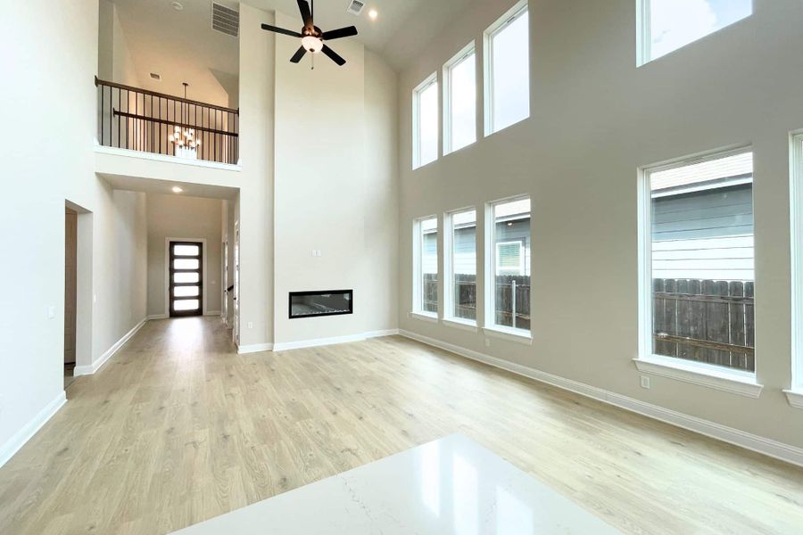 Spacious, unfurnished interior of a new home in Whisper Valley, Manor (Image 21).