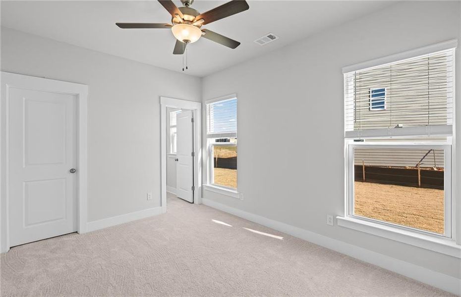 Spacious, unfurnished interior of a new home in Creekside at Skelton, Jefferson (Image 19).