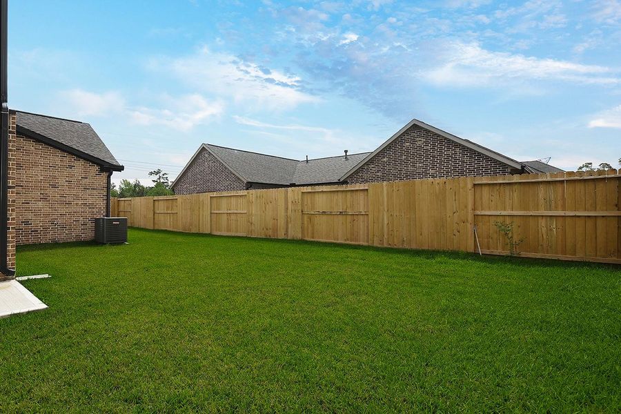 Exterior details and patio area of a home in , Spring (Image 4).