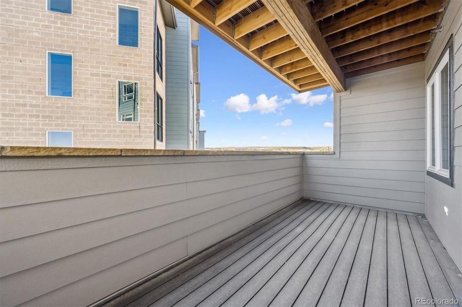 Exterior details and patio area of a home in Condo Collection at Grand Vue at Interlocken, Broomfield (Image 1).