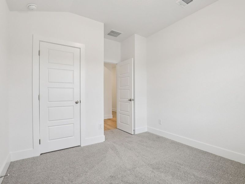 Secondary bedroom in the Callaghan floorplan at a Meritage Homes community.