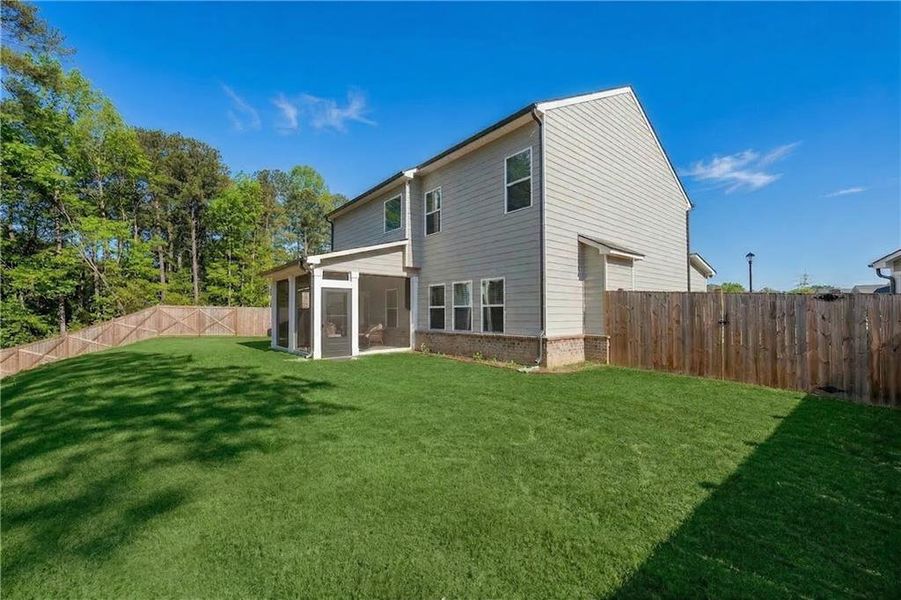 Exterior details and patio area of a home in Westgate Estates, Loganville (Image 19).
