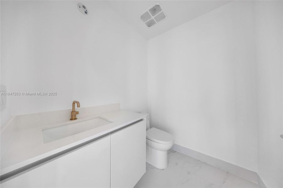 Furnished interior view inside a new home in Aria Reserve, Miami (Image 10).