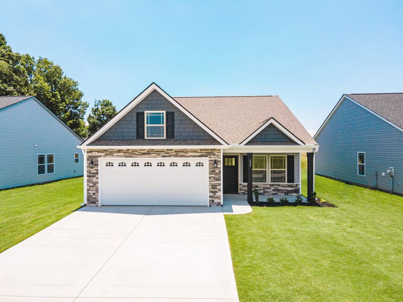 Representative exterior photo of a completed home built from the Wellford by Enchanted Homes in Arcadia Village, Spartanburg, SC (Image 2). Representative exterior photo of a completed home built from the Wellford by Enchanted Homes in Arcadia Village, Spartanburg, SC (Image 2).