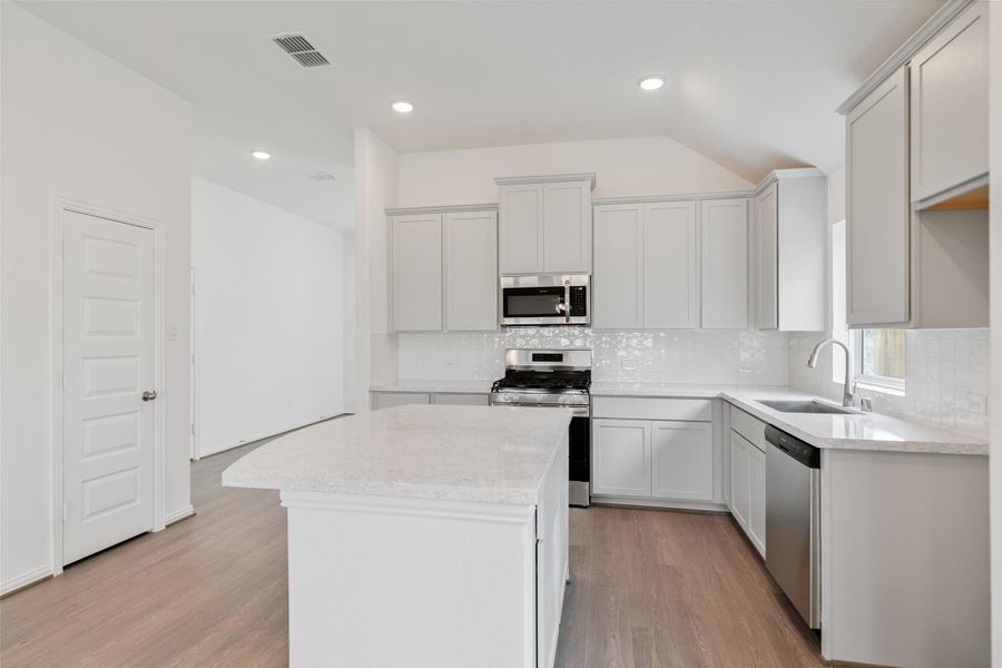 Furnished interior view inside a new home in Westland Ranch, League City (Image 13).