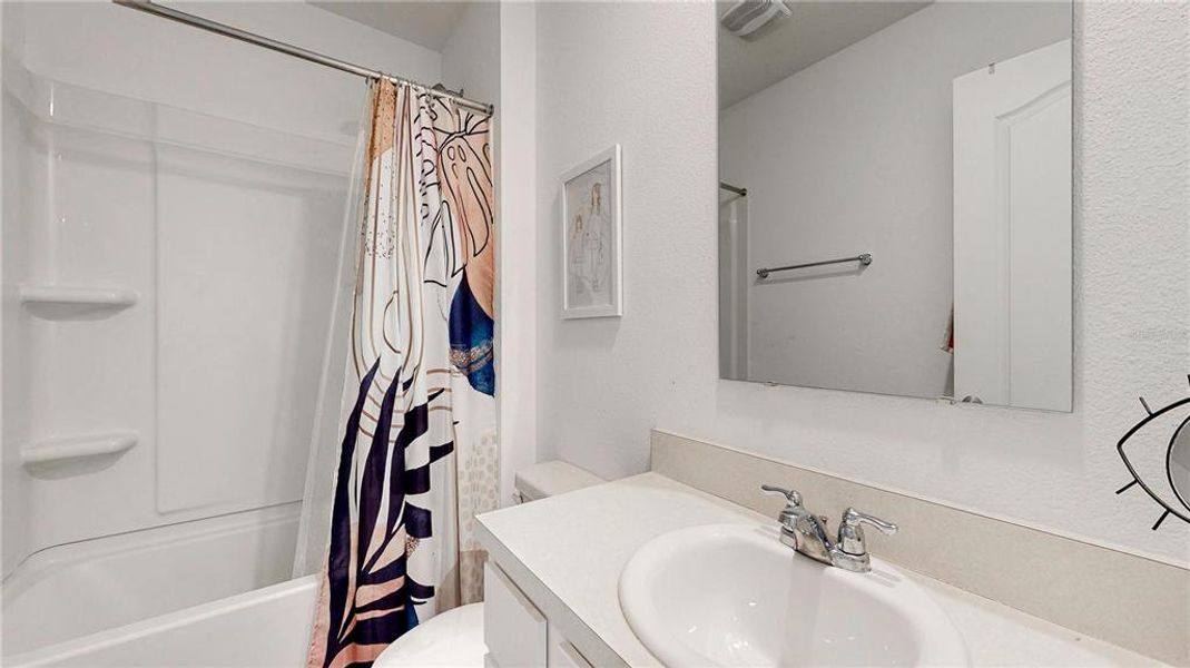 Furnished interior view inside a new home in Sawmill Branch Express, Palm Coast (Image 30).