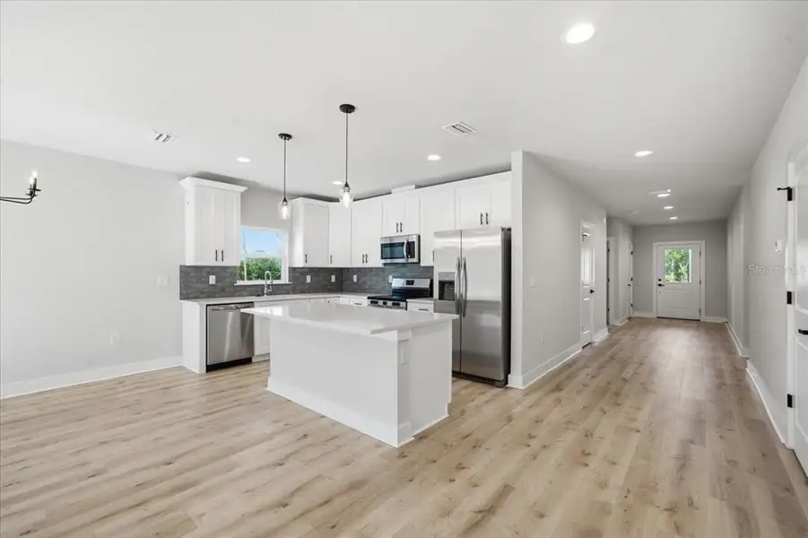Furnished interior view inside a new home in , Weeki Wachee (Image 6).