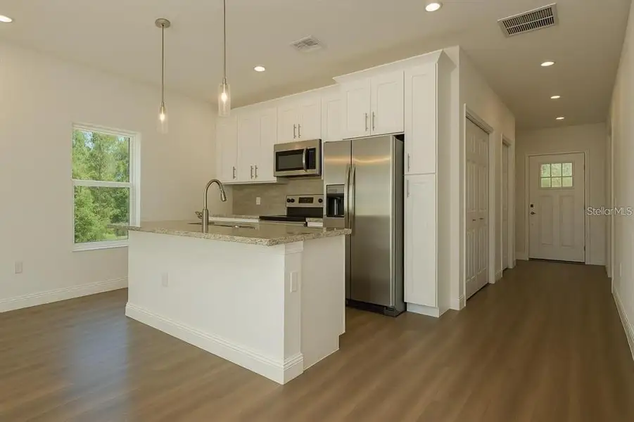 Furnished interior view inside a new home in , Weeki Wachee (Image 6). Furnished interior view inside a new home in , Weeki Wachee (Image 6).