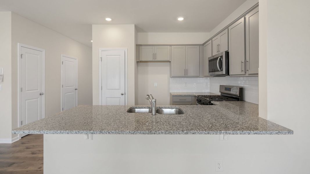 Furnished interior view inside a new home in Clock Road Townhomes, New Bern (Image 8).