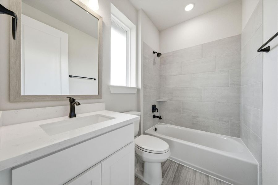 Furnished interior view inside a new home in Chambers Creek, Willis (Image 11).