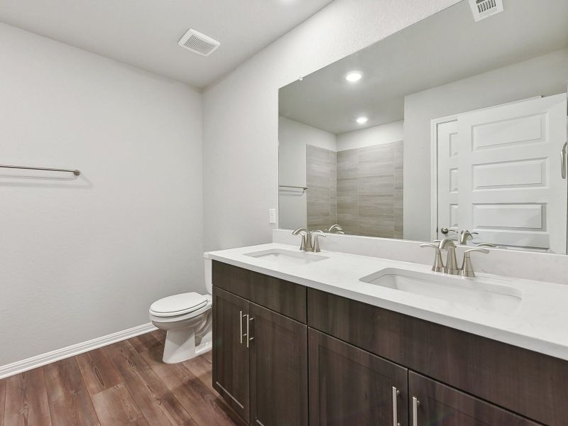 Furnished interior view inside a new home in Big Sky Ranch - Executive Collection, Dripping Springs (Image 6).