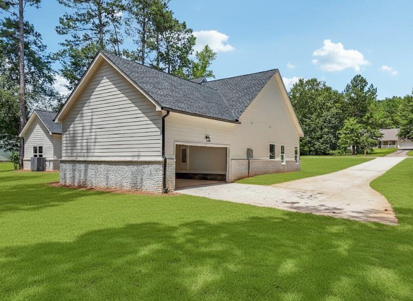 Front exterior of a new home in , Monroe, GA, highlighting curb appeal (Image 23). Front exterior of a new home in , Monroe, GA, highlighting curb appeal (Image 23).