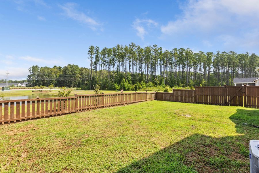 Exterior details and patio area of a home in Sweetgrass at Summers Corner, Summerville (Image 23).