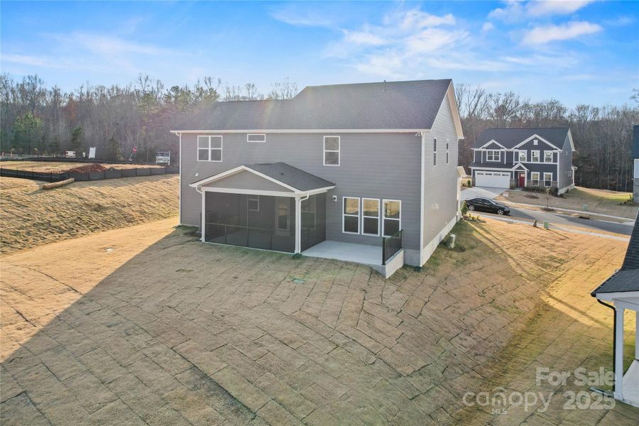 Exterior details and patio area of a home in Forest Creek, Waxhaw (Image 25).