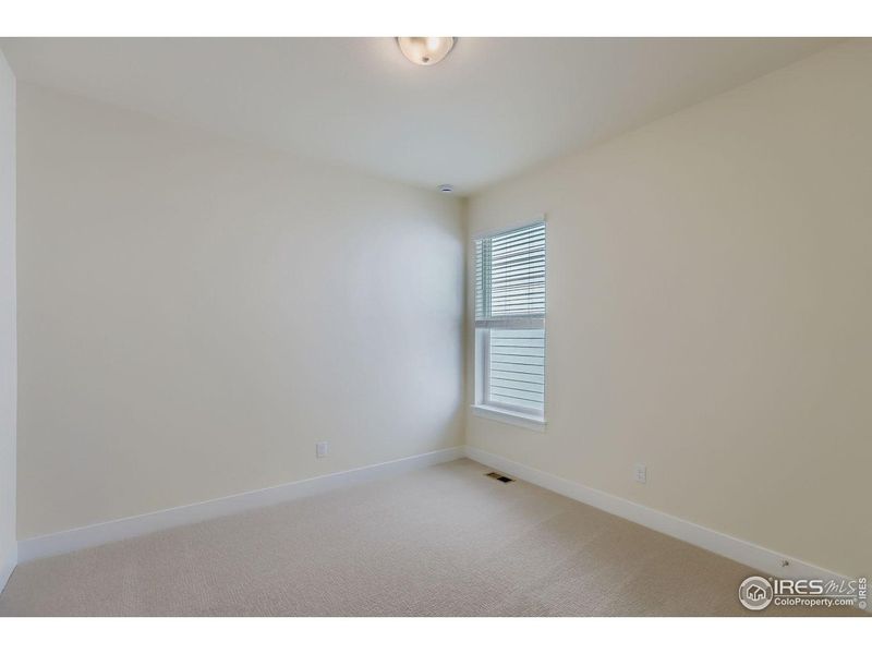 Spacious, unfurnished interior of a new home in RainDance, Windsor (Image 20).