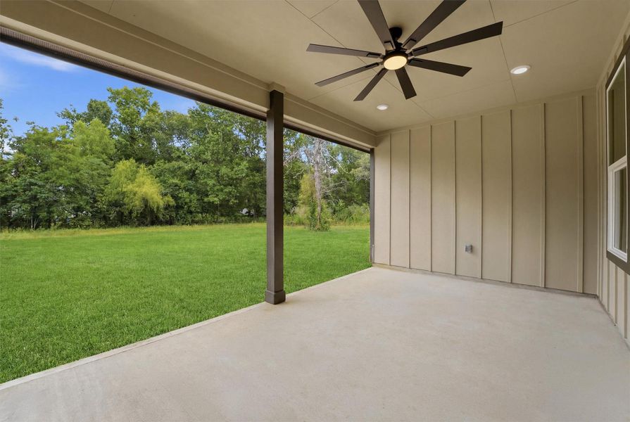 Exterior details and patio area of a home in , Conroe (Image 3).
