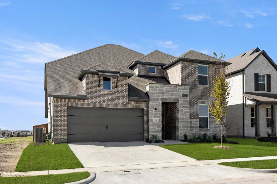 Representative exterior photo of a completed home built from the Hero by Rockwell Homes in Creekside, Royse City, TX (Image 33). Representative exterior photo of a completed home built from the Hero by Rockwell Homes in Creekside, Royse City, TX (Image 33).