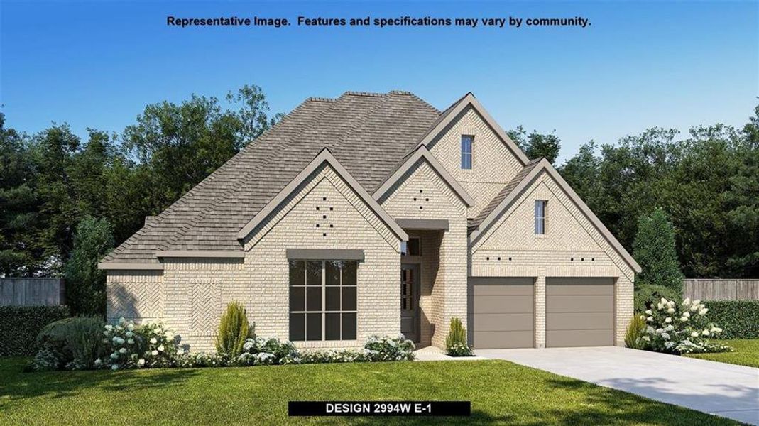 View of front of home featuring a garage and a front lawn