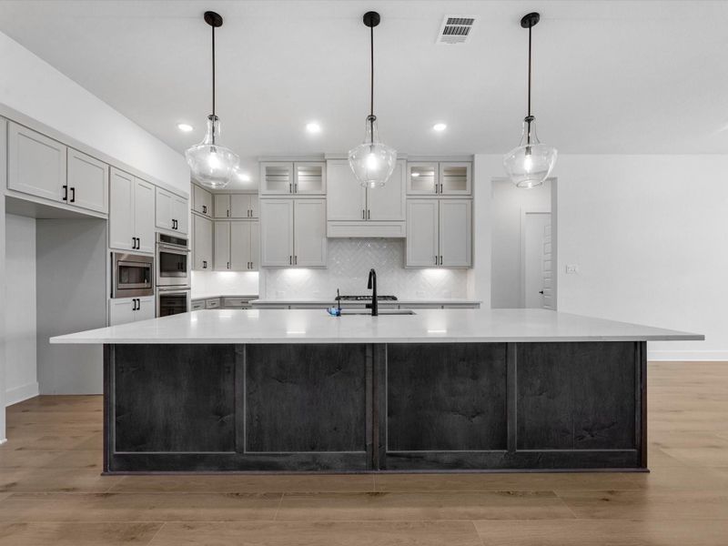 Furnished interior view inside a new home in Woodson’s Reserve, Spring (Image 5).
