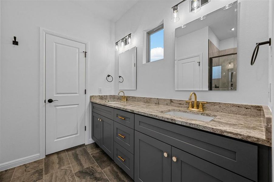 Bathroom with vanity and an enclosed shower