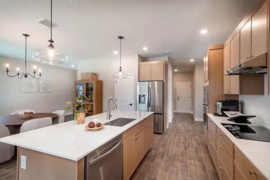A beautifully designed kitchen with sleek cabinetry, elegant fixtures, and an inviting layout crafted for cooking, gathering, and connection. A beautifully designed kitchen with sleek cabinetry, elegant fixtures, and an inviting layout crafted for cooking, gathering, and connection.