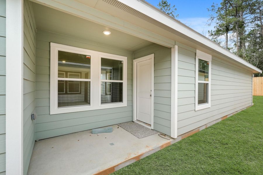 Exterior details and patio area of a home in William Trails, Willis (Image 10).