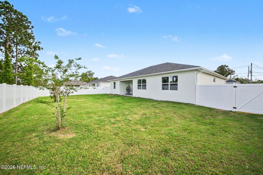 Exterior details and patio area of a home in Palm Coast, Palm Coast (Image 3).