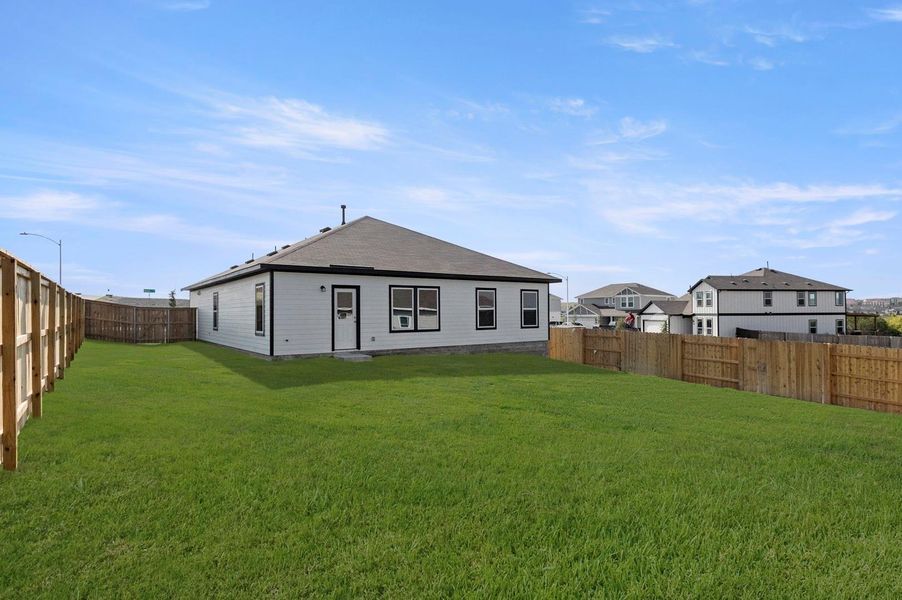 Exterior details and patio area of a home in Cloverleaf, Austin (Image 4).