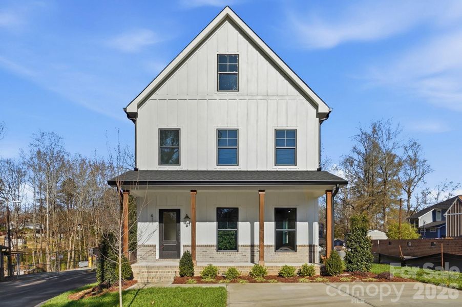 Front exterior of a new home in , Waxhaw, NC, highlighting curb appeal (Image 1). Front exterior of a new home in , Waxhaw, NC, highlighting curb appeal (Image 1).