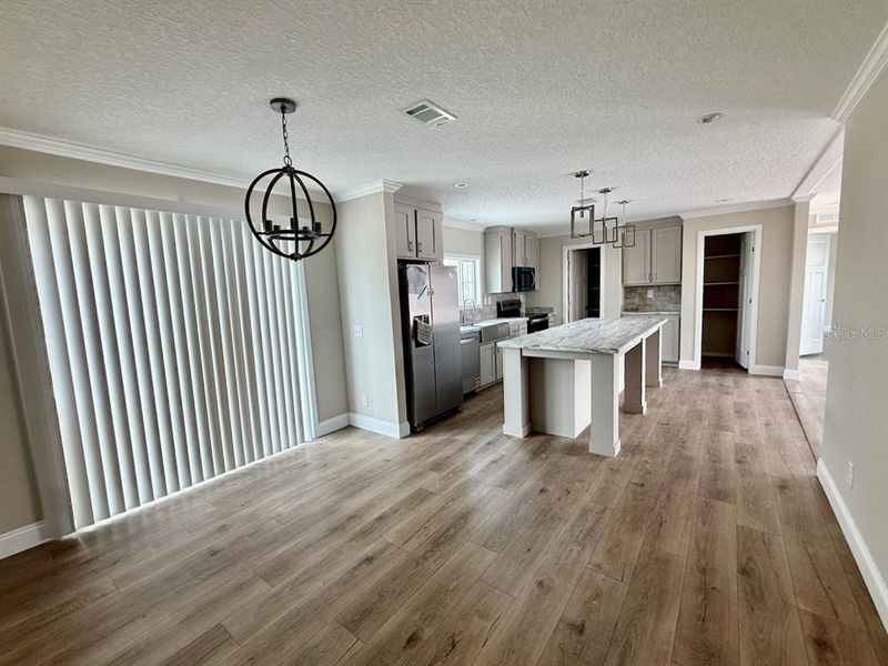 Furnished interior view inside a new home in , Okeechobee (Image 26).