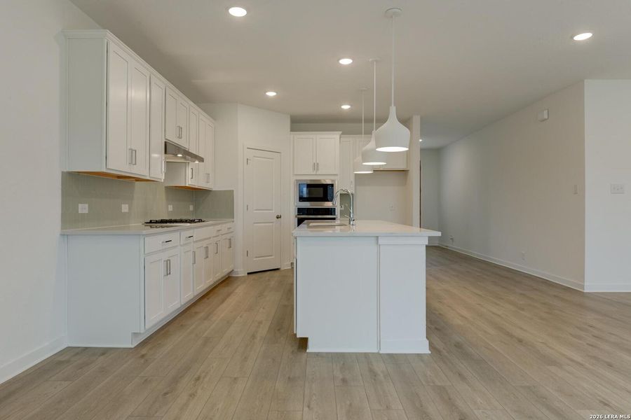 Furnished interior view inside a new home in Nopal Valley, San Antonio (Image 6).