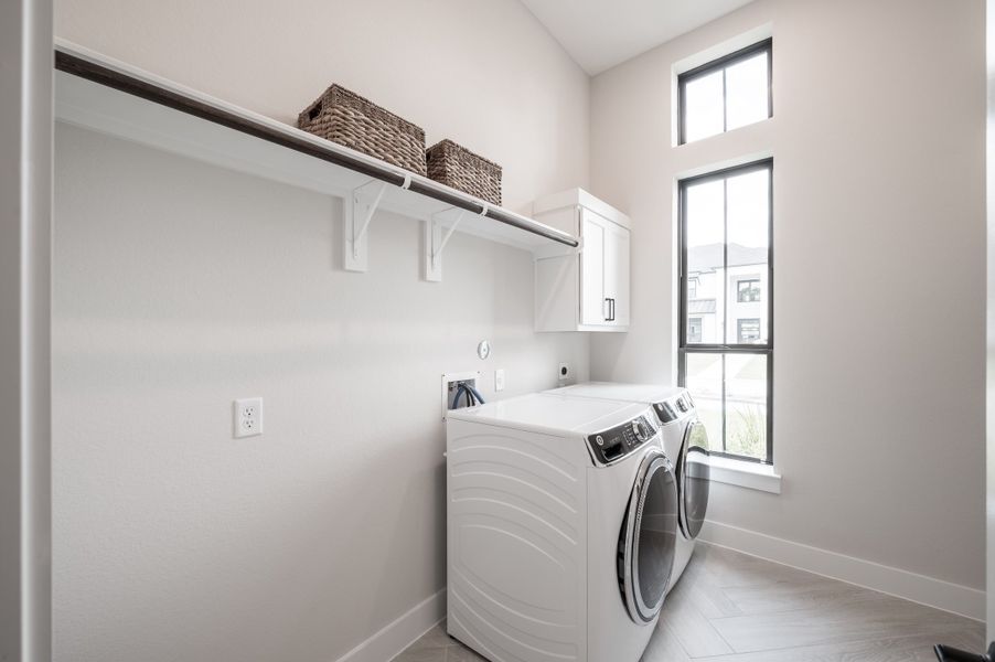 Representative furnished interior of a home built from the Carignan by Tri Pointe Homes in Sienna 80′, Missouri City (Image 15).