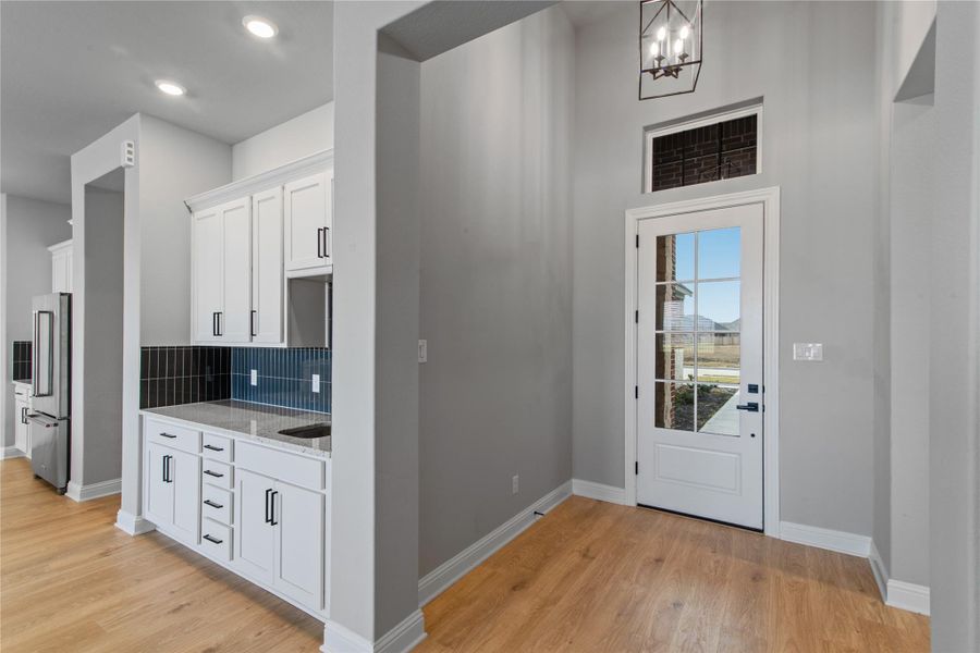 Spacious and inviting foyer with elegant design.