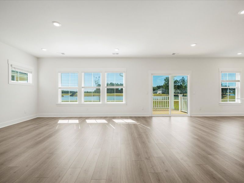 Spacious, unfurnished interior of a new home in The Coves at Lakes of Cane Bay II, Summerville (Image 15).