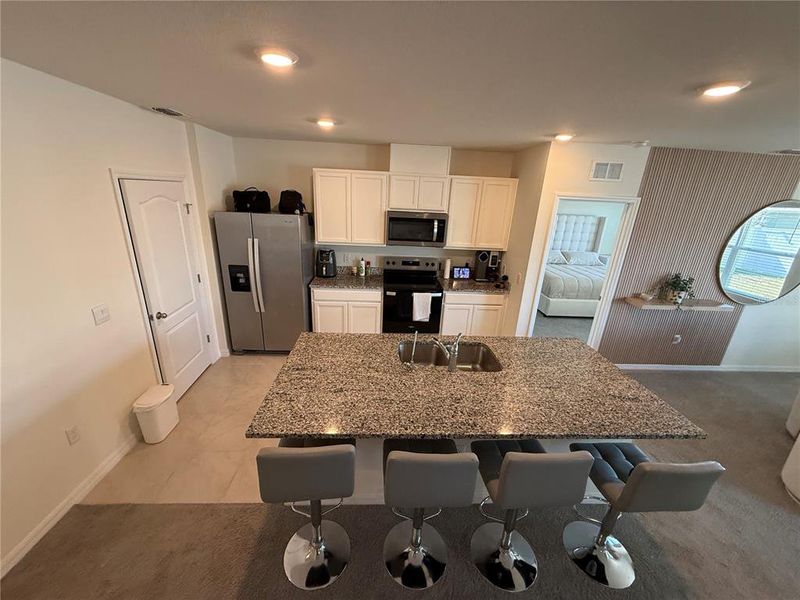 Furnished interior view inside a new home in Cypress Park Estates, Haines City (Image 16).