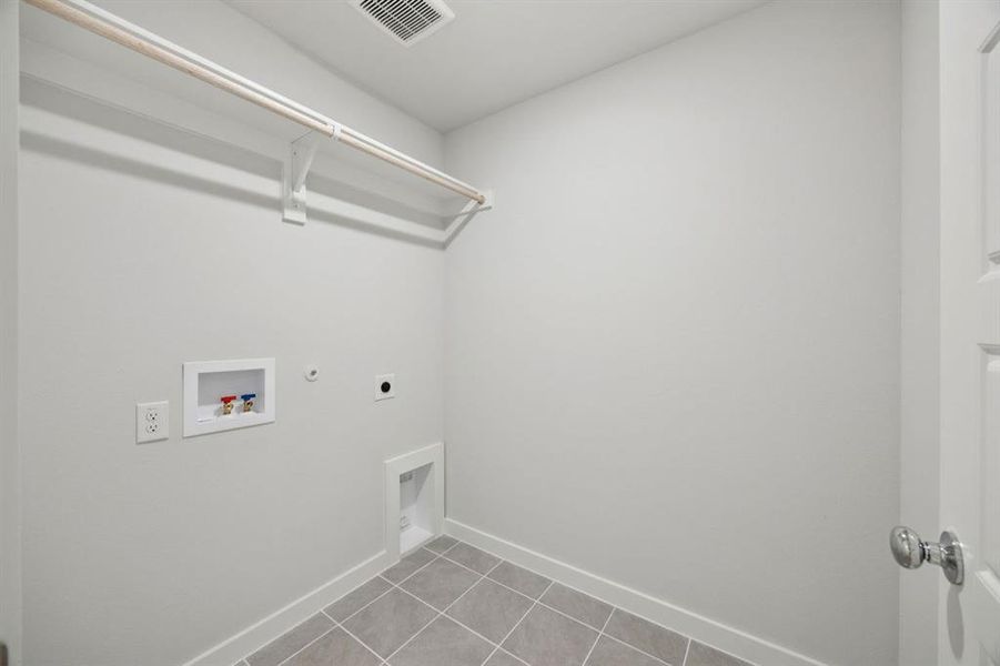 Utility Room in the Hadley home plan by Trophy Signature Homes – REPRESENTATIVE PHOTO Utility Room in the Hadley home plan by Trophy Signature Homes – REPRESENTATIVE PHOTO