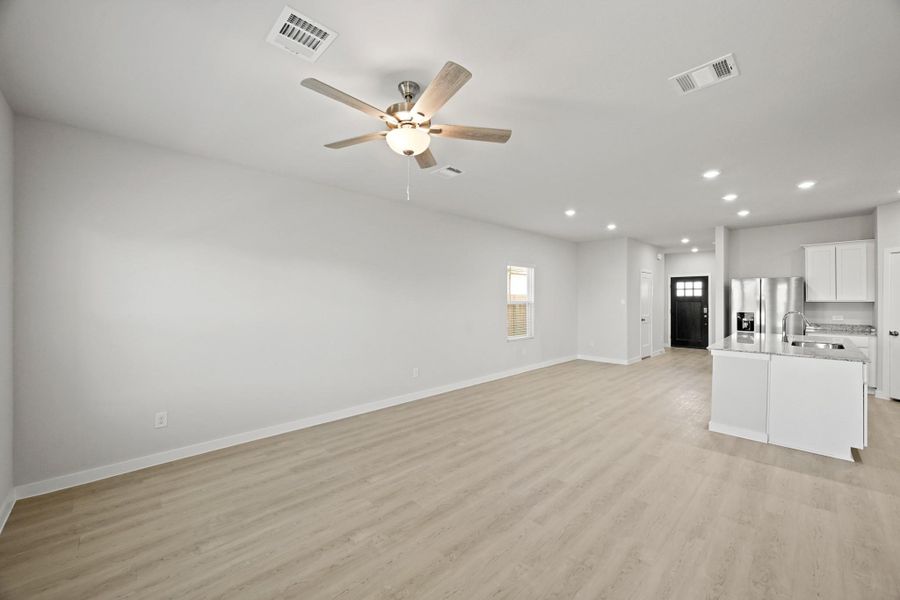 Spacious, unfurnished interior of a new home in Lonestar Collection at Paloma at Sanford Farms, Waller (Image 31).