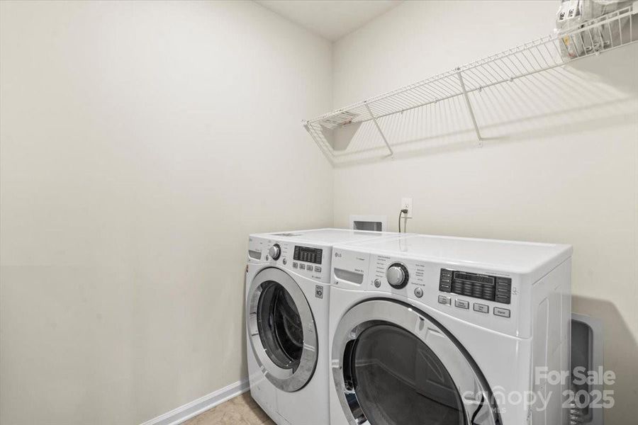 laundry room located just off the primary bedroom, washer and dryer to remain with home laundry room located just off the primary bedroom, washer and dryer to remain with home