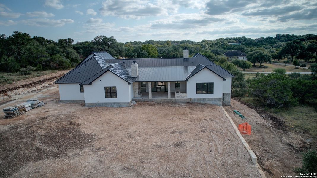 Front exterior of a new home in , New Braunfels, TX, highlighting curb appeal (Image 2). Front exterior of a new home in , New Braunfels, TX, highlighting curb appeal (Image 2).