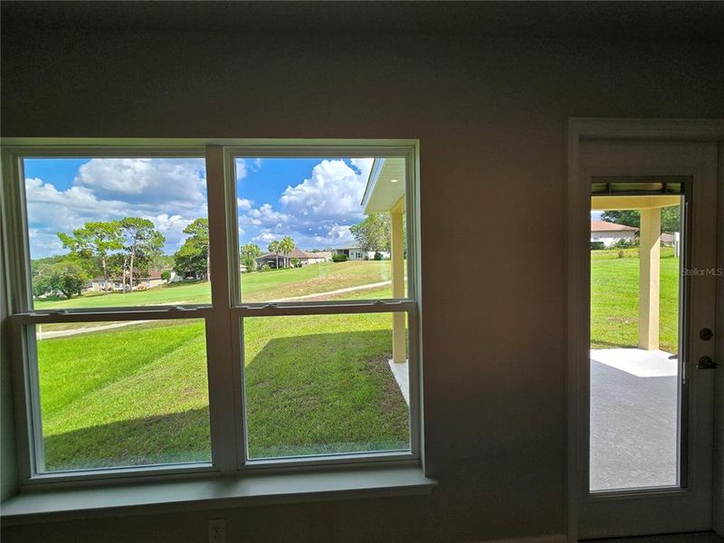 living room back window and door to covered lanai living room back window and door to covered lanai