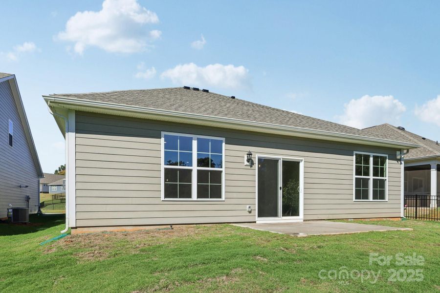 Exterior details and patio area of a home in Brookside, Troutman (Image 4).